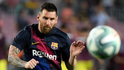 Barcelona's Argentine forward Lionel Messi warms up before the La Liga match against Villarreal at Camp Nou on Tuesday. AFP