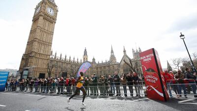 Stanley Biwott of Kenya passes Big Ben during the 2016 Virgin Money London Marathon on April 24, 2016 in in London, England. Joel Ford/Getty Images