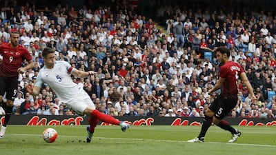 Hakan Calhanoglu scores the first goal for Turkey. Reuters / Phil Noble