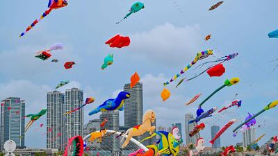 People take part in the Colombo International Kite Festival. AFP