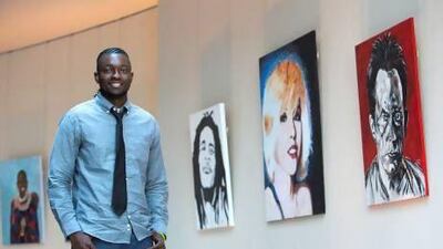 Victor Sitali with his works at Al Badia Golf Club in Dubai. Jaime Puebla / The National