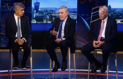 Mohamed El-Erian, left, with former UK prime minister Gordon Brown and Michael Spence, dean emeritus at the Stanford Graduate School of Business, during a TV interview in London in 2023. Bloomberg