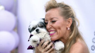 Boujie Paws Co's owner Dawn Appel and her pet dog, Hepburn. Chris Whiteoak / The National
