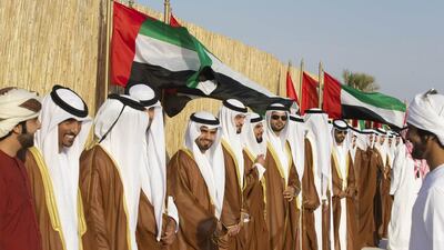 The grooms line up at the mass wedding which was attended by Sheikh Hamdan bin Zayed