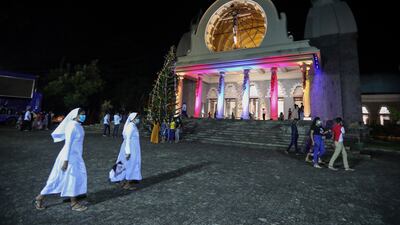 Worshipers attend the Christmas Eve midnight Mass at The Basilica of Our Lady of Lanka in Ragama suburb of Colombo, Sri Lanka. EPA