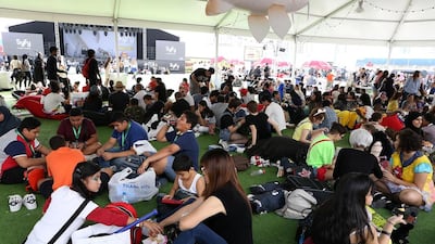 Visitors take some time out. Pawan Singh / The National