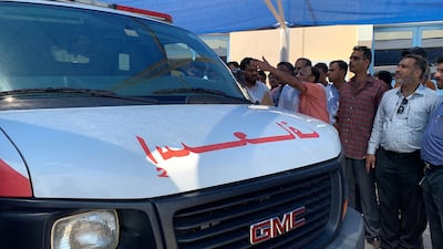 Relatives and friends of the 17 people who died in the incident at Sonapur Embalming Centre in Dubai. Pawan Singh / The National