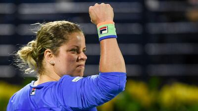Kim Clijsters of the Belgium during her close-fought match with Garbine Muguruza of Spain at the WTA Dubai Duty Free Tennis Championship. AFP