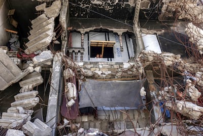 A make-shift shelter amid the rubble of a heavily damaged building in Khan Yunis in southern Gaza. AFP