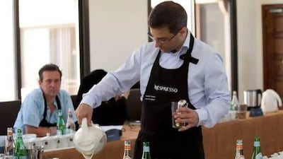 Edouard Thomas, Atelier de Creation pours hot water in different single origin coffees at the Nespresso Chef Academy Program at the Emirates Academy for Hospitality. Razan Alzayani / The National
