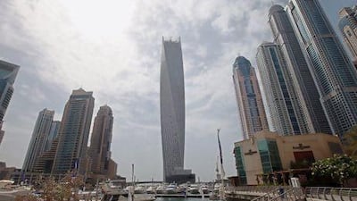 Another landmark: Infinity Tower on Dubai Marina, which turns 90 degrees, is, at 306 metres, the tallest "twisted" tower in the world. The building will officially be inaugurated tonight. Ali Haider / EPA