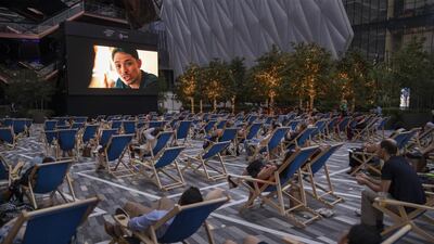 Moviegoers watch a screening of 'In the Heights' at the Tribeca Festival in Hudson Yards. Bloomberg