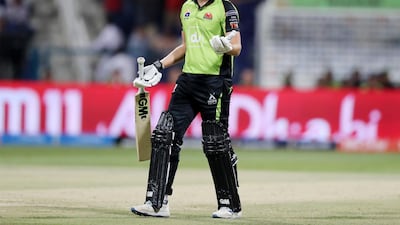 Qalandars' Dawid Malan shrugs his shoulders after team mate Phil Salt is run out. Chris Whiteoak / The National
