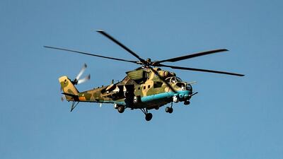 A Russian army helicopter flies over the town of Tal Tamr in the northeastern Syrian Hasakeh province on the border with Turkey on January 26, 2020. AFP