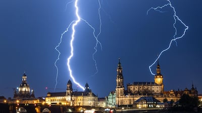 Lightning flashing through the sky over Dresden during a thunderstorm. AFP / DPA