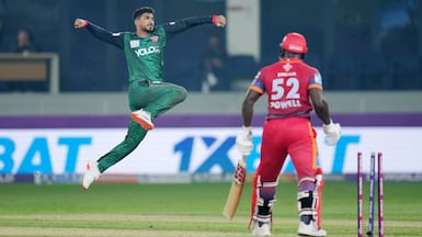 Desert Vipers' Khuzaima Tanveer celebrates the wicket of Rovman Powell of Dubai Capitals during the opening match of the DP World International League T20 in Dubai. Photo: ILT20