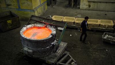 Molten aluminium sits in a cradle at a smelting plant. Chinese producers seem to be riding hgh. Bloomberg