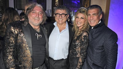 Robert Tchenguiz, left, Vincent Tchenguiz, his sister Lisa Tchenguiz and US businessman Steve Varsano at a party on January 23, 2016 in London, England. (Photo by David M. Benett/Dave Benett/Getty Images)