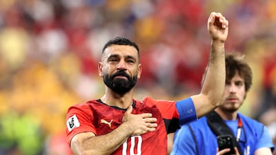 Mohamed Salah applauds fans after Egypt's victory over Australia following of a penalty shoot-out in the 2026 World Cup last-32 match in Dallas. AFP
