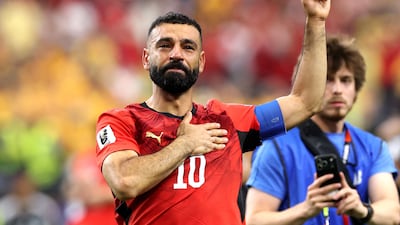 Mohamed Salah applauds fans after Egypt's victory over Australia following of a penalty shoot-out in the 2026 World Cup last-32 match in Dallas. AFP