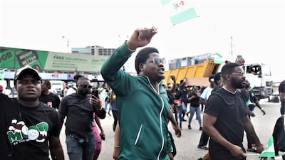 A protester shouts slogans at the rally. EPA