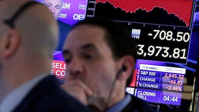 Traders work on the floor of the New York Stock Exchange before the closing bell on Thursday, March 22, 2018. (AP)