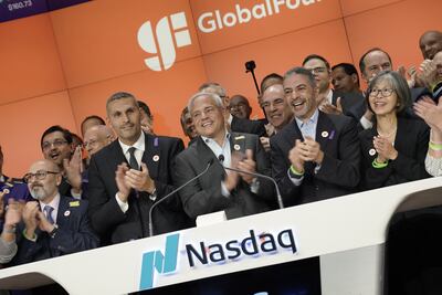 Khaldoon Al Mubarak, second from left, front row, chief executive and managing director of Mubadala Investment Company, and Thomas Caulfield, third from left, chief executive of GlobalFoundries, during the Nasdaq bell ringing on Thursday. Photo: Mubadala