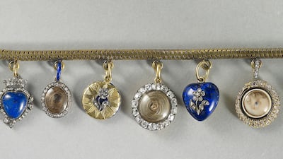 A bracelet with nine lockets, one with a miniature of the left eye of Princess Charlotte of Wales. Photo: Royal Collection Trust / © His Majesty King Charles III 2023