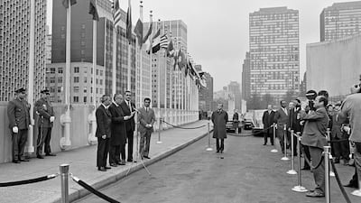 The Secretary-General is seen here as he read a statement prior to the flag-raising on December 10, 1971. From left to right are: Adam Malik, President of the 26th session of the General Assembly; Secretary-General, U Thant; Adnan Pachachi, Minister of State of the United Arab Emirates (UAE) and Chairman of the delegation; and Mohamed Abdul Latif, Director of the Department of International Organizations of the Ministry of Foreign Affairs of that country. Courtesy UN Photo/Saw Lwin