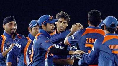 India's bowler Ashish Nehra, celebrates the wicket of Sri Lankan batsman Angelo Mathews during the final of the Asia Cup.