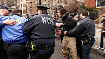 The activist is detained by police