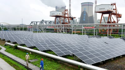 A solar power plant in Zhejiang Province. China controls more than 80 per cent of global solar panel manufacturing. Reuters