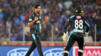 New Zealand's Ish Sodhi celebrates after the dismissal of India's Rahul Tripathi. AFP