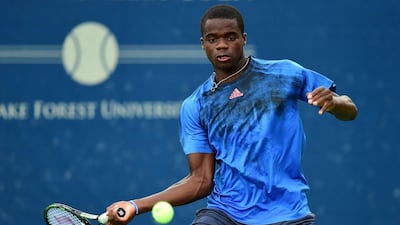 Frances Tiafoe returns a shot from James Duckworth during his first round win at the Winston-Salem Open on Monday. Jared C Tilton / Getty Images / AFP / August 24, 2015