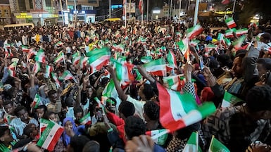 Residents wave Somaliland flags as they gather in downtown Hargeisa to celebrate Israel’s announcement recognising Somaliland’s statehood. AFP