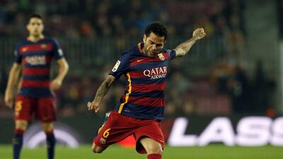 Dani Alves shoots and scores Barcelona’s opening goal in their 6-1 win over Villanovense on Wednesday night in the Copa del Rey. Albert Gea / Reuters