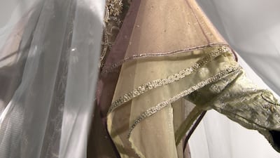 Created in three layers, this embellished thawb kandurah featured in the exhibition accompanying the launch of the book 'Sultani, Traditions Renewed: Changes in Women’s Traditional Dress in the UAE During the Reign of Sheikh Zayed bin Sultan Al Nahyan 1966-2004', by Reem El Mutwalli. Made from heavily embellished silk, it was a gift from Sheikha Shamsa bint Hamdan Al Nahyan, wife of Sheikh Hamdan bin Zayed Al Nahyan.