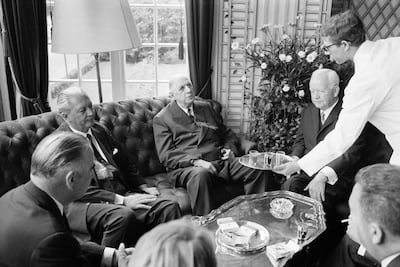 Algeria was granted independence during the presidency of Charles de Gaulle, seen here in the centre. AFP