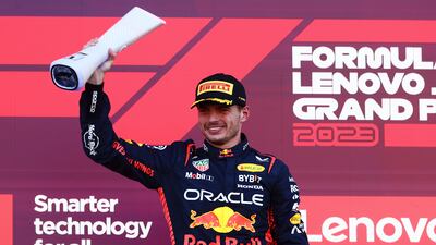 Max Verstappen lifts the trophy after winning the Japanese Grand Prix at Suzuka Circuit. Getty