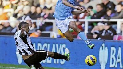 Manchester City's Gael Clichy, right, wants his teammates to show more spirit.