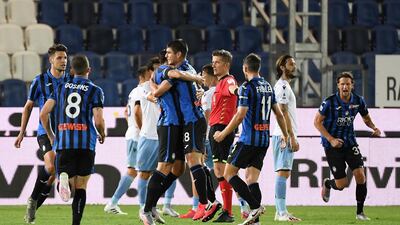 Atalanta's Ruslan Malinovskyi celebrates scoring his team's second goal. Reuters