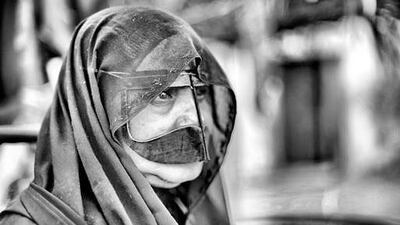 Woman in a burqa. Courtesy Yousif AlHarmoudi