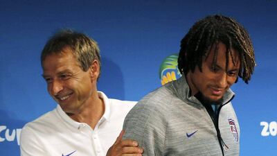 USA national soccer team head coach Jurgen Klinsmann, left, and player Jermaine Jones attend a press conference ahead of their match against Portugal, in Manaus June 21, 2014. REUTERS/Siphiwe Sibeko