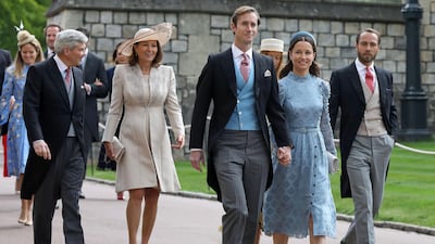 Michael and Carole Middleton, James Matthews, Pippa Middleton and James Middleton arrive at Windsor Castle. AFP