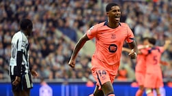 Marcus Rashford celebrates scoring Barcelona's opening goal in their Champions League win at Newcastle United earlier this season. Getty Images