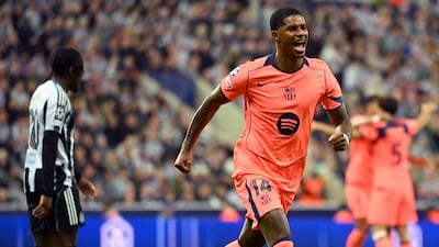 Marcus Rashford celebrates scoring Barcelona's opening goal in their Champions League win at Newcastle United earlier this season. Getty Images