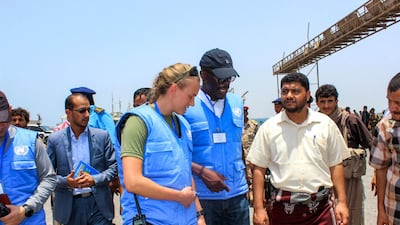 UN observers meet local officials during the Houthi rebel withdrawal from Saleef port in Hodeidah on May 11, 2019. AFP