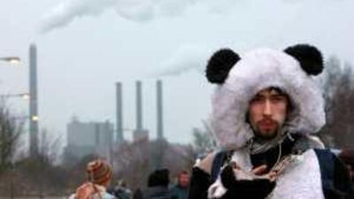 No doubt: A protester finds a novel way to make his point during a demonstration at the United Nations Climate Change Conference 2009 in Copenhagen.