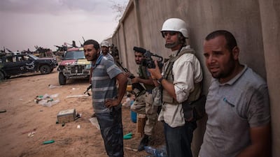 James Foley, second right, in the documentary Jim: The James Foley Story. Manu Brabo / Sundance Institute via AP Photo