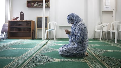 SM, 27, says this Ramadan she's trying to focus on praying on time, and trying to do it at the mosque more frequently. Mona Al Marzooqi/ The National
